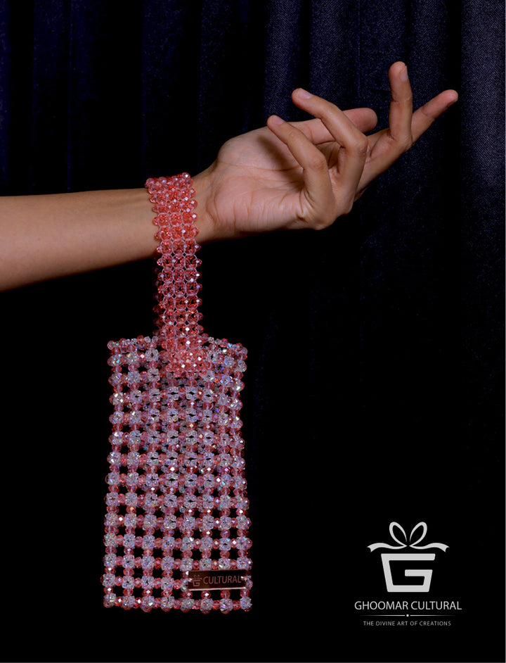 Turn heads with our Handcrafted Blush Pink Crystal Mobile Clutch – a perfect blend of sparkle and sophistication. Adorned with shimmering crystals and designed to fit all phone sizes, this elegant party wear purse adds a touch of glam to weddings, festive events, and special occasions