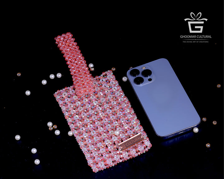Turn heads with our Handcrafted Blush Pink Crystal Mobile Clutch – a perfect blend of sparkle and sophistication. Adorned with shimmering crystals and designed to fit all phone sizes, this elegant party wear purse adds a touch of glam to weddings, festive events, and special occasions