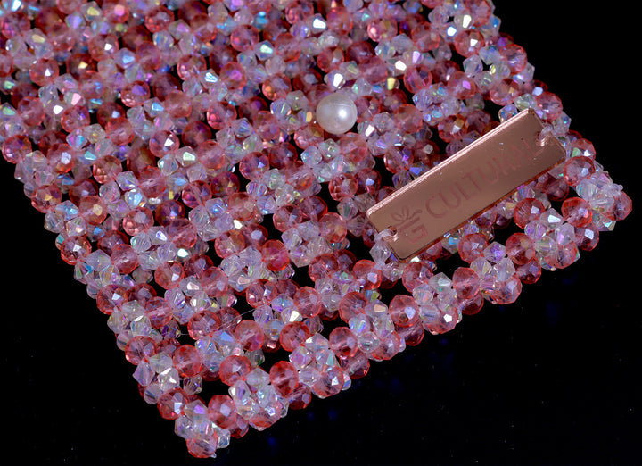 Turn heads with our Handcrafted Blush Pink Crystal Mobile Clutch – a perfect blend of sparkle and sophistication. Adorned with shimmering crystals and designed to fit all phone sizes, this elegant party wear purse adds a touch of glam to weddings, festive events, and special occasions
